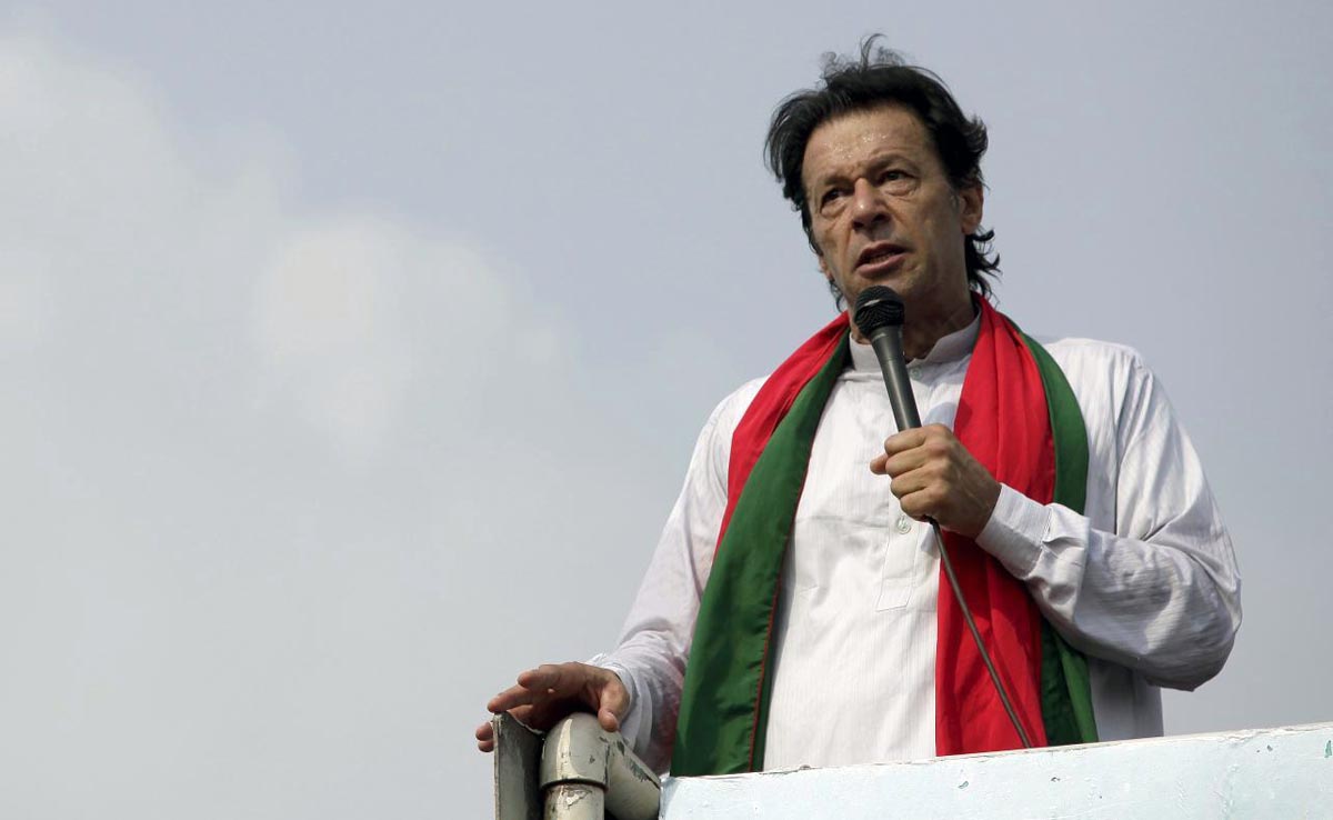 In this file photo, Chairman of the Pakistan Tehreek-e-Insaf (PTI) political party Imran Khan addresses his supporters during what has been dubbed a “freedom march” in Islamabad on Aug. 21, 2014. (REUTERS)
