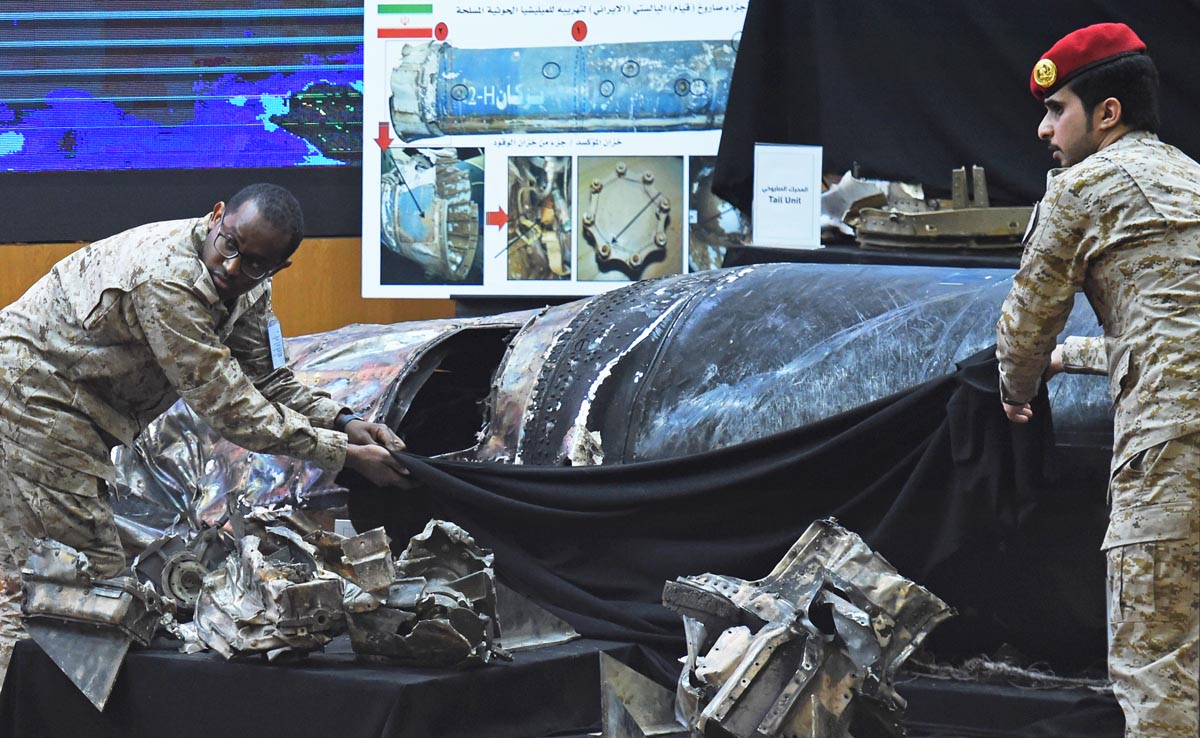 In this file photo, Saudi soldiers reveal the remains of missiles at the Armed Forces club in Riyadh on March 26, 2018. (AFP)