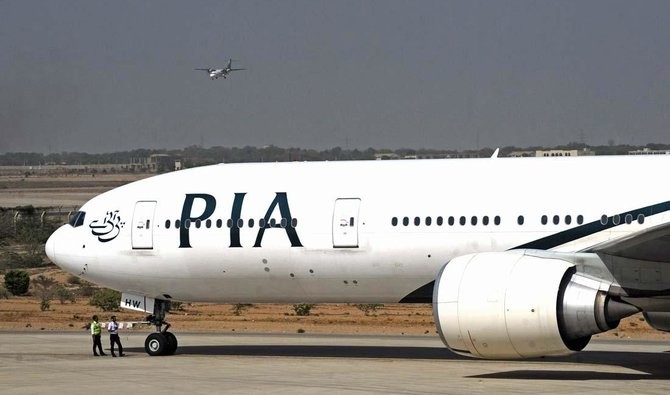 In this file photo, Pakistan International Airlines (PIA) plane taxies before take-off from Karachi International Airport in Karachi on April 21, 2010. (AFP)