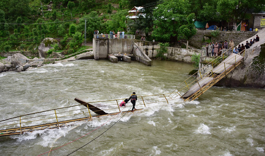 Pakistani rescuers search for missing university students after a bridge collapsed in Kundal Shahi, Neelum district on May 13, 2018. (AFP)