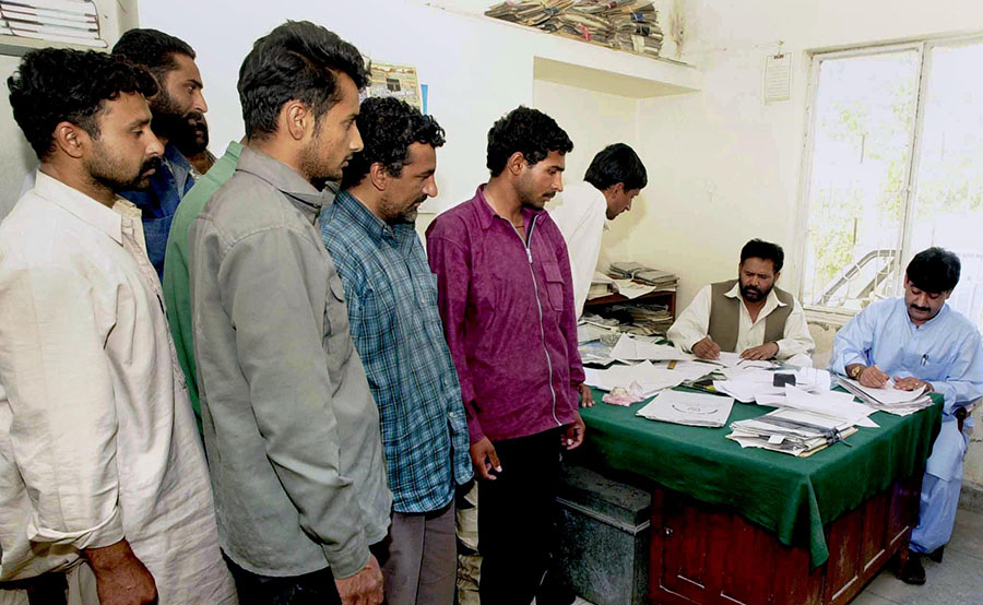 Iranian security forces handed over 76 illegal Pakistani immigrants to the levies force at the Pak-Iran border area of Chaghi district on Sunday. (AFP)