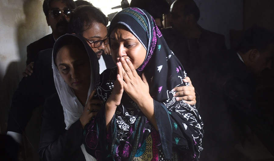 In this file photo, former Pakistani prisoner Asma Nawab reacts as she enters her house after her release in Karachi on April 7, 2018. (AFP)
