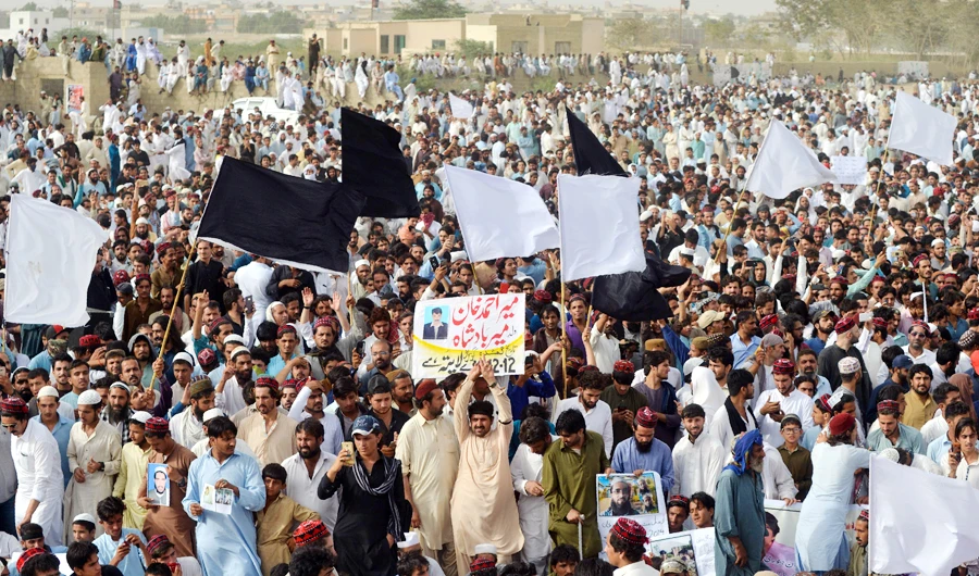 Supporters and activists of Pashtun Protection Movement (PTM) wait for their leader Manzoor Pastheen during a protest rally in Karachi on May 13,2018. (AFP)