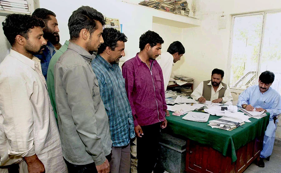 Iranian security forces handed over 76 illegal Pakistani immigrants to the levies force at the Pak-Iran border area of Chaghi district on Sunday. (AFP)