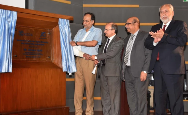 Interior Minister Ahsan Iqbal, left, inaugurated Pakistan’s first National Center for Cyber Security at Air University, Islamabad, on May 21, 2018. (Photo courtesy: Ministry of Planning, Development and Reform/Twitter)