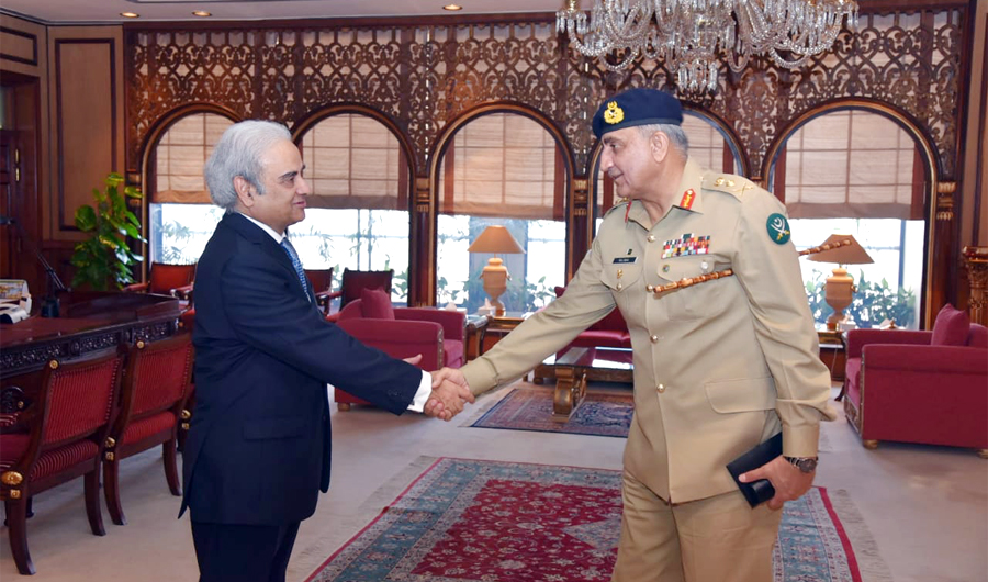 Army chief Gen. Qamar Javed Bajwa meets with caretaker Prime Minister Nasir-ul-Mulk at the latter’s office on Wednesday (Photo by PM’s office)