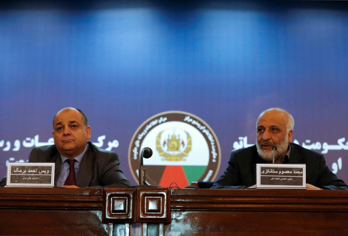 Afghanistan’s Interior Minister Wais Ahmad Barmak, left, and Afghanistan’s National Directorate of Security Director (NDS) Mohammed Masoom Stanekzai attend a joint news conference in Kabul. (Reuters)