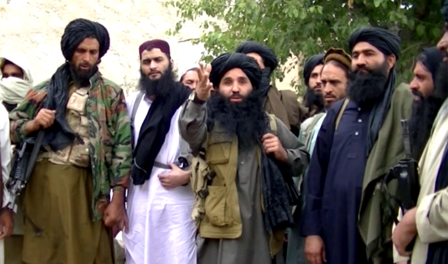 A video grab taken from an undated video released by the Tehrik-e-Taliban Pakistan (TTP) shows its slain chief Mullah Fazlullah (C) at an known location at Pak-Afghan border. Fazlullah was killed by a US drone on 13 June 2018 in Kunar province, Afghanistan. (EPA)