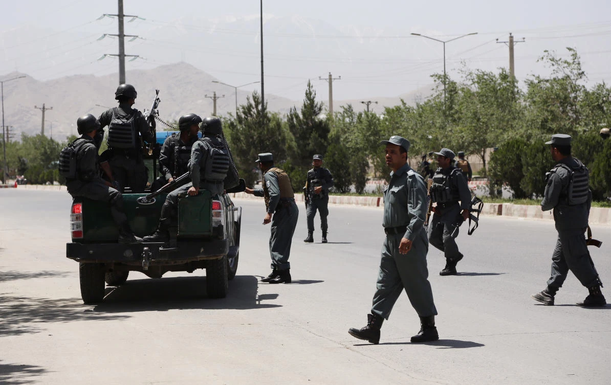 Security personnel arrive at the site of an attack in the Afghan Interior Ministry in Kabul, Afghanistan, Wednesday, May 30, 2018. (AP)