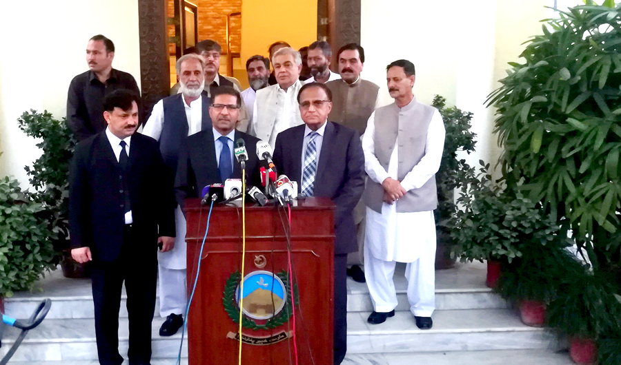 Caretaker Federal Law Minister Syed Ali Zafar, Chief Minister Khyber Pakhtunkhwa (KP) Dost Muhammad Khan and others speaking to the media after a meeting over the FATA-KP merger at the Chief Minister Secretariat on Wednesday.