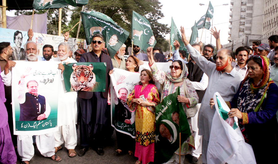 Supporters of PML-N in the streets of Karachi on Friday protesting the accountability court verdict that sentenced Sharif to prison for 10 years and his daughter Maryam Nawaz for seven years in a graft case against them. (AN Photo by M. F. Sabir)