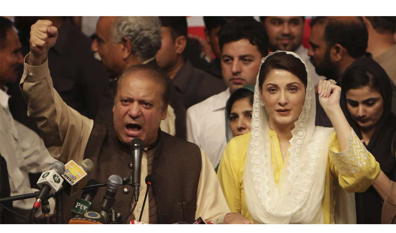 In this file photo, Pakistani former Prime Minister Nawaz Sharif, left, addresses a ceremony to commemorate the 20th anniversary of nuclear tests by Pakistan, with his daughter Maryam Nawaz in Lahore, Pakistan, Monday, May 28, 2018. (K.M. CHAUDARY/AP)