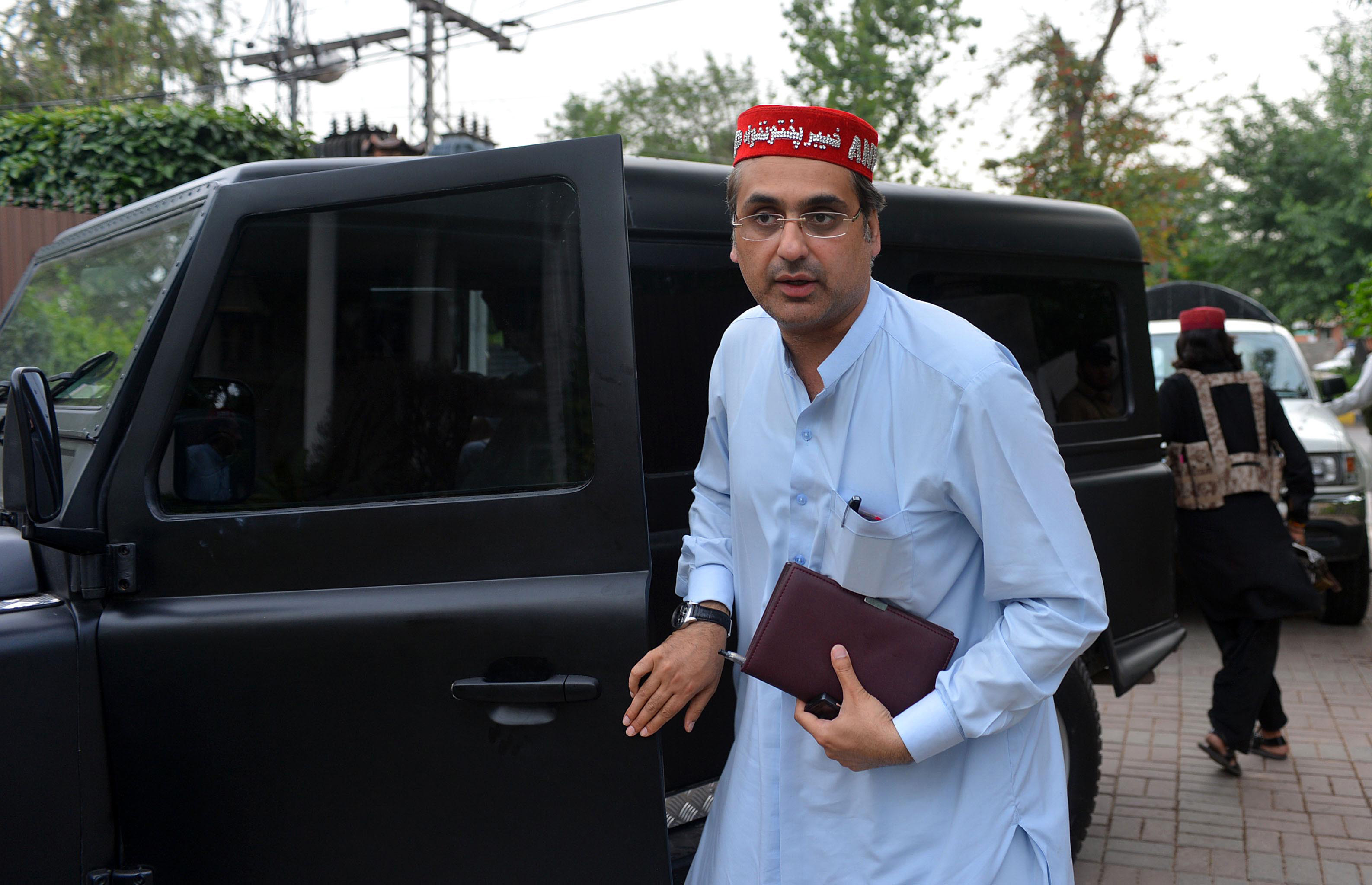 This file photo shows Haroon Bilour arriving at his residence in Peshawar on April 25, 2013. (A MAJEED/AFP)