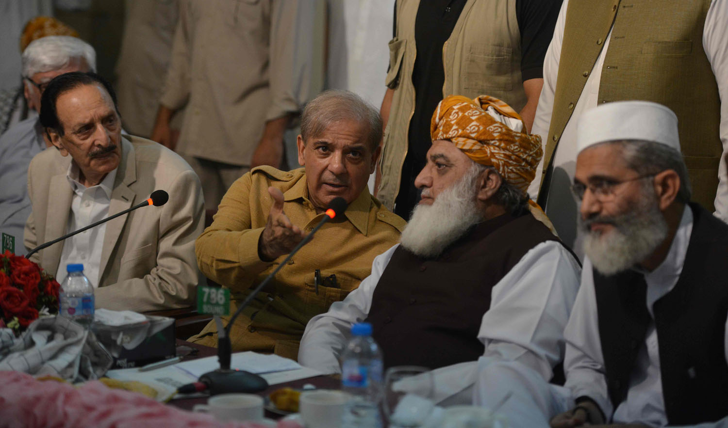 Pakistani opposition leader Maulana Fazalur Rehman (2nd R) and Shahbaz Sharif (2ndL), the younger brother of ousted Pakistani prime minister and head of Pakistan Muslim League-Nawaz (PML-N), attend an All Parties Conference in Islamabad on July 27, 2018. (AAMIR QURESHI/AFP)