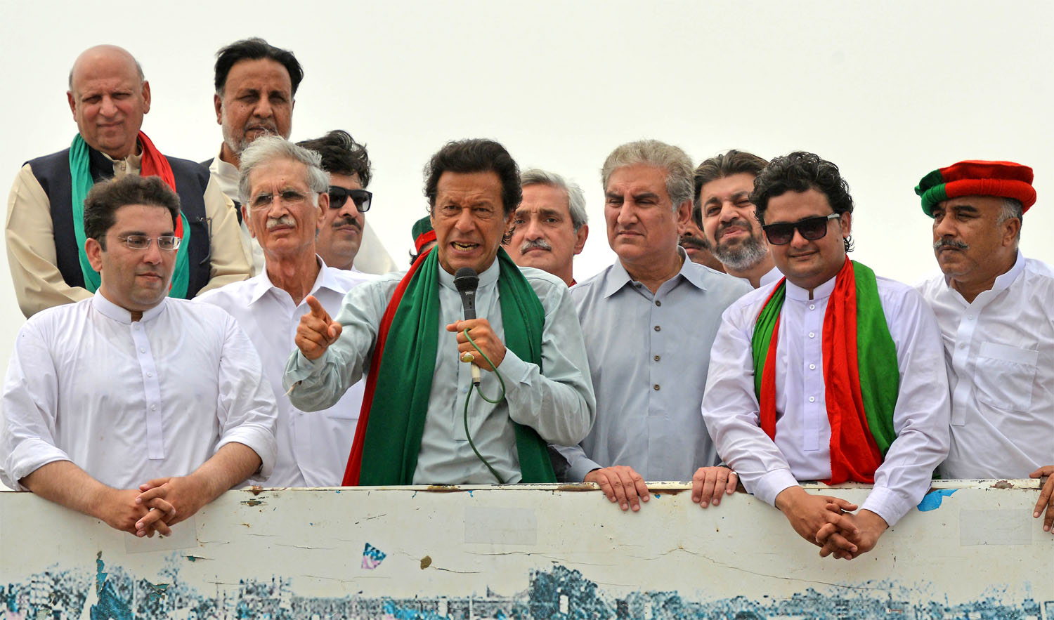 In this file photo, Pakistan Tehrik-e-Insaf (PTI) chairman Imran Khan, center, addresses participants at the start of the Tehrik-e-Ehtesab rally in Peshawar on Aug. 7, 2016. (A MAJEED/AFP)
