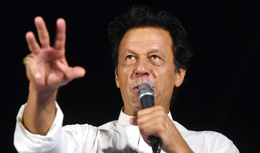 Pakistani cricketer-turned-politician and head of the Pakistan Tehreek-i-Insaf (PTI) Imran Khan gestures as he addresses supporters during an election campaign rally in Karachi on July 03, 2018. (AFP)