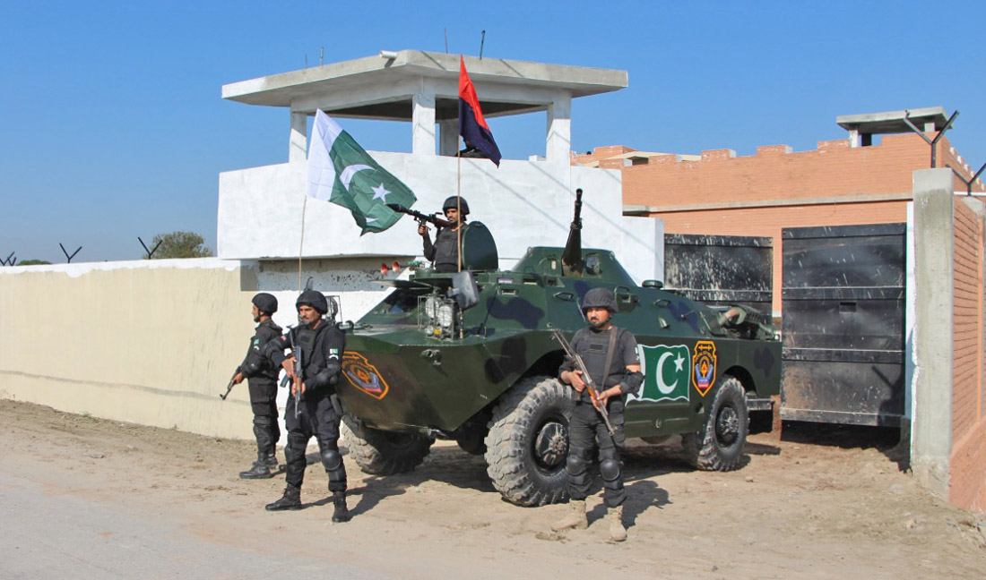 Police stand guard at one of the bomb-proof check posts set up at the boundary of the KP capital Peshawar. (Photo courtesy: Peshawar police)