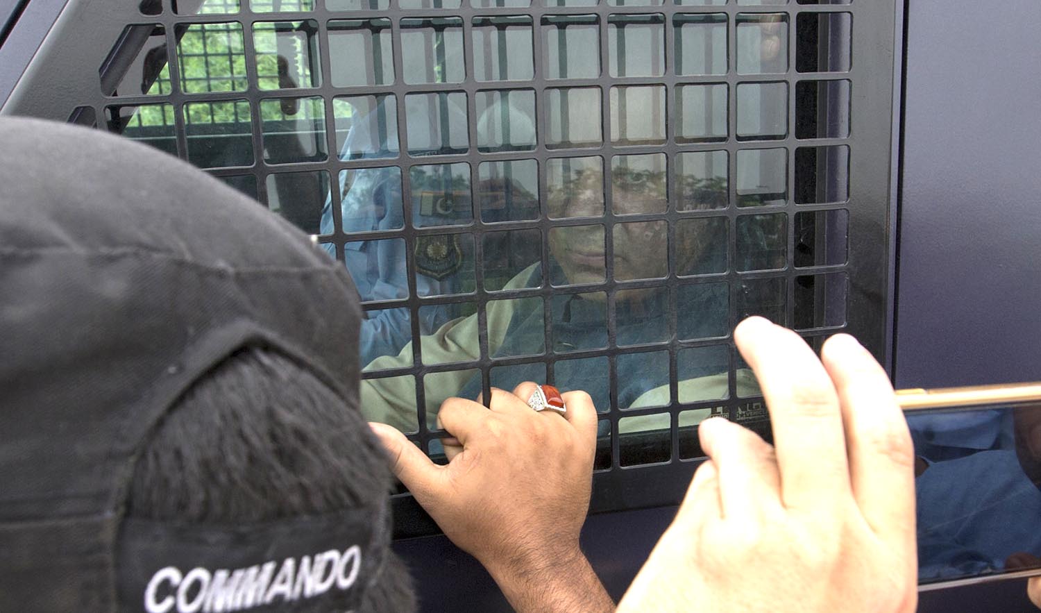 Pakistan's jailed and ousted prime minister Nawaz Sharif leaves an accountability court in an armored car after a court appearance in two corruption cases, in Islamabad, Pakistan, Monday, Aug. 13, 2018. (B.K. BANGASH/AP)
