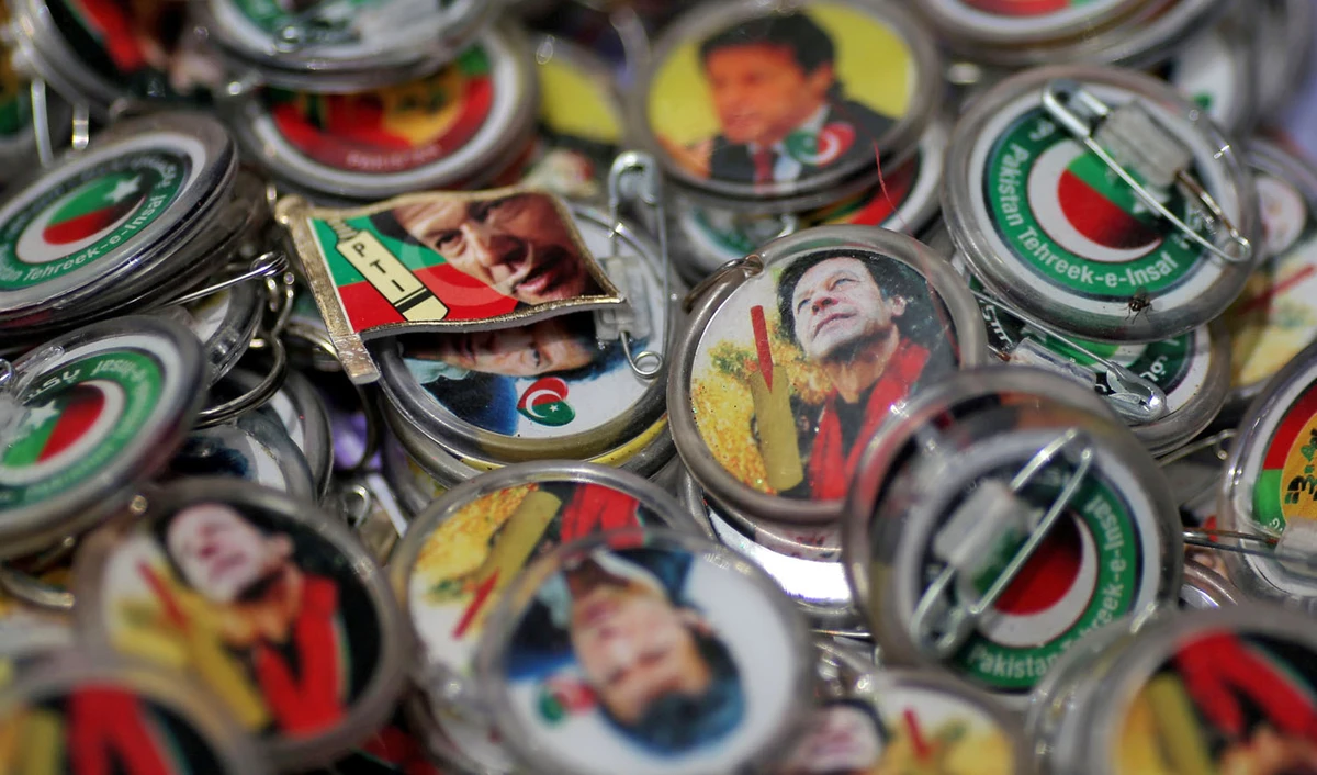 Pins with images of Imran Khan, leader of the Pakistan Tehreek-e-Insaf (PTI), are pictured at a market a day after the general election in Islamabad, Pakistan, July 26, 2018. (REUTERS/ATHIT PERAWONGMETHA/FILE)