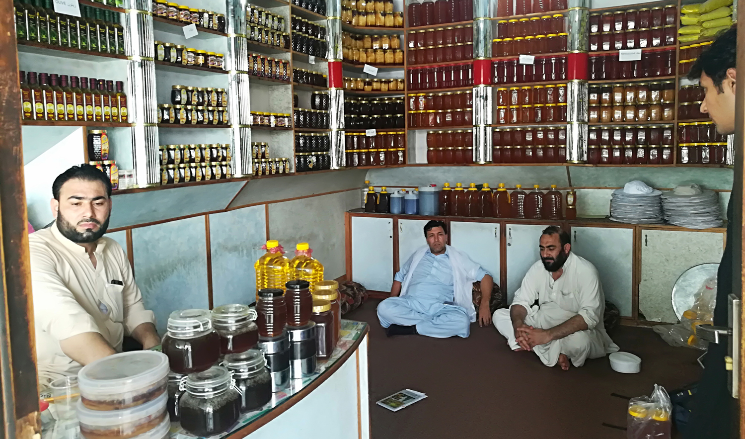 People in a shop selling different varieties of honey at the Pak International Honey Market. (AN photo)