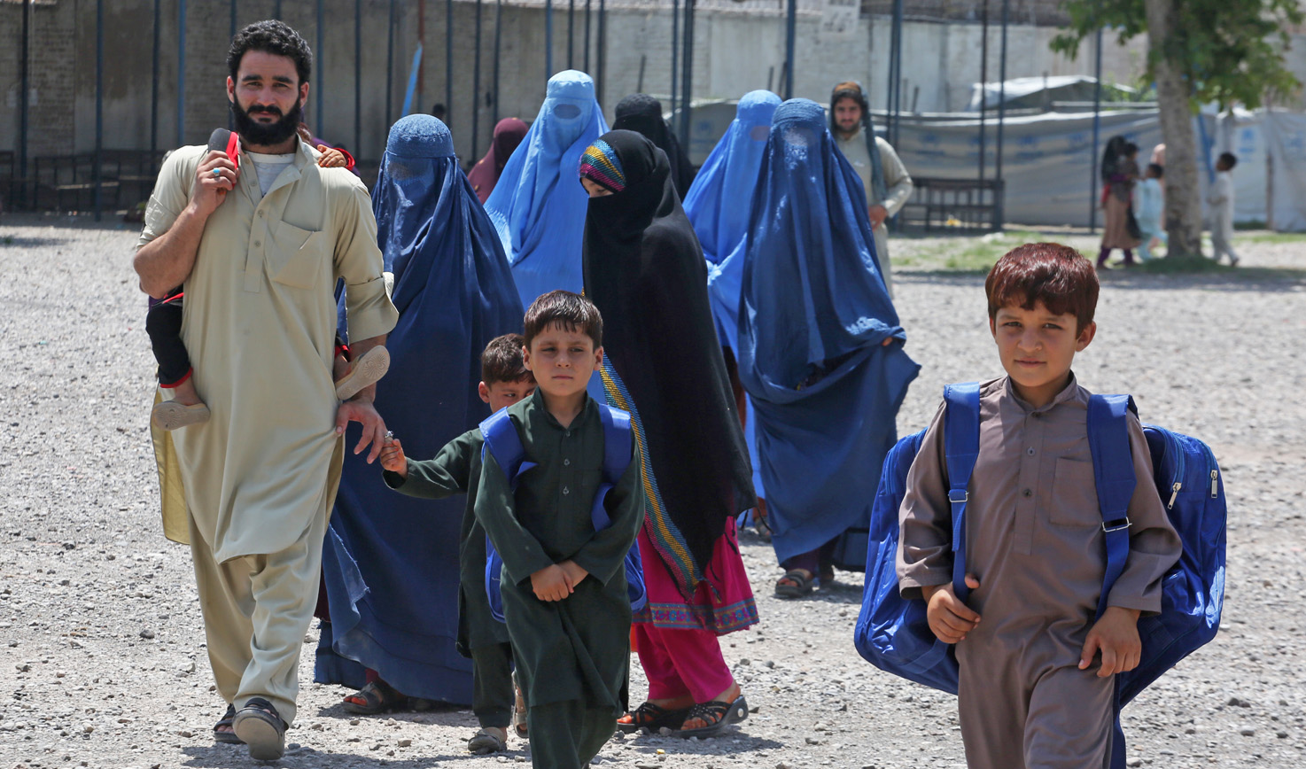 An Afghan family while registering at a repatriation center in Peshawar