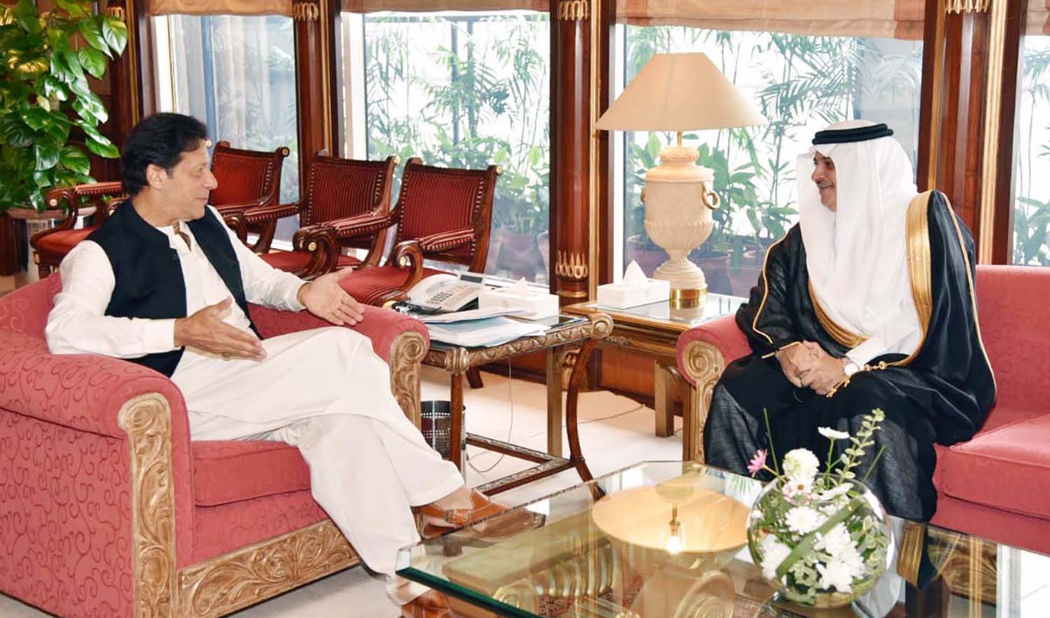 This file photo shows, Saudi Ambassador to Pakistan Nawaf Bin Said Al-Malki, right, with Prime Minister Imran Khan. (Photo courtesy: PID)