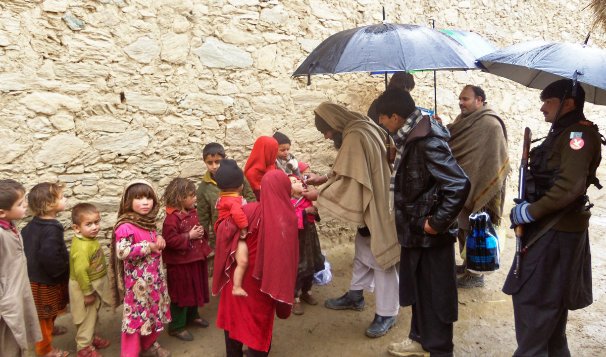 Children below the age of five years being administered anti-polio drops in the tribal region. (Photo courtesy: EOC Khyber Pakhtunkhwa)