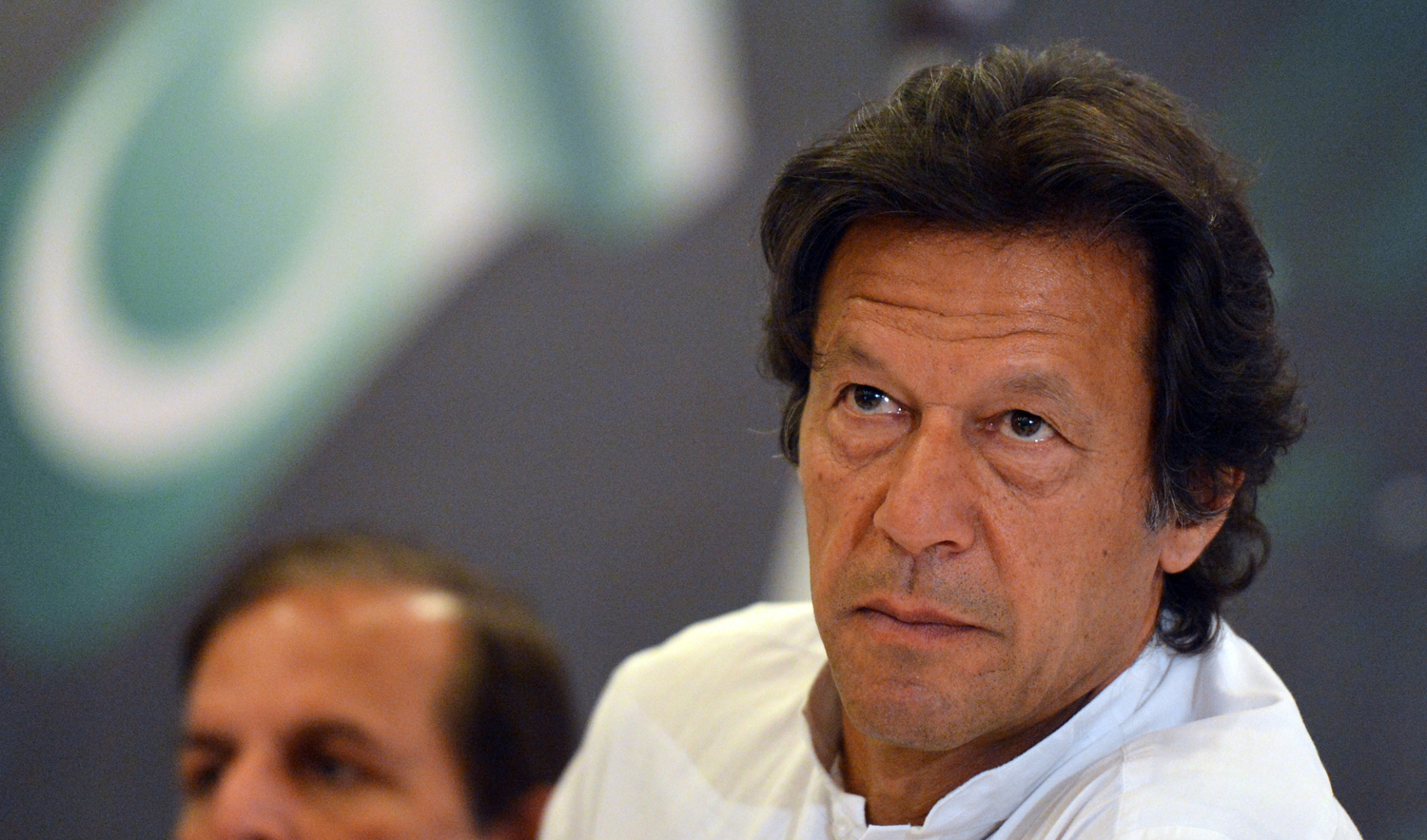 In this file photo, Pakistani Prime Minister Imran Khan attends the unveiling of his party manifesto for the general election in Islamabad on April 9, 2013. (AFP)