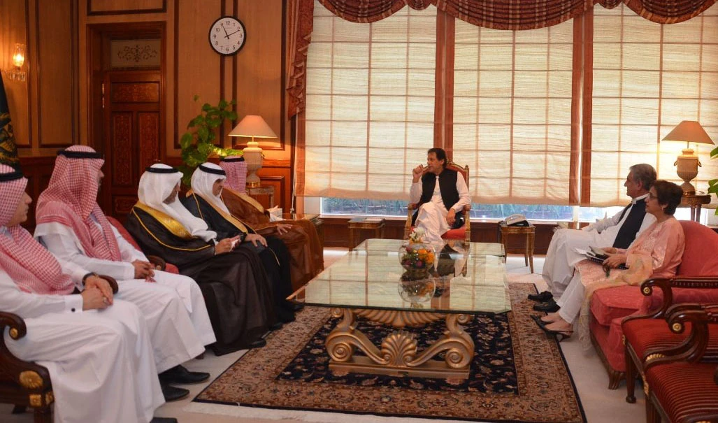 Pakistani Prime Minister Imran Khan received Saudi Arabia’s Media Minister Dr. Awwad bin Saleh Al-Awwad at his office in Islamabad on Sunday. (Photo courtesy: @PakEmbRiyadh/Twitter)