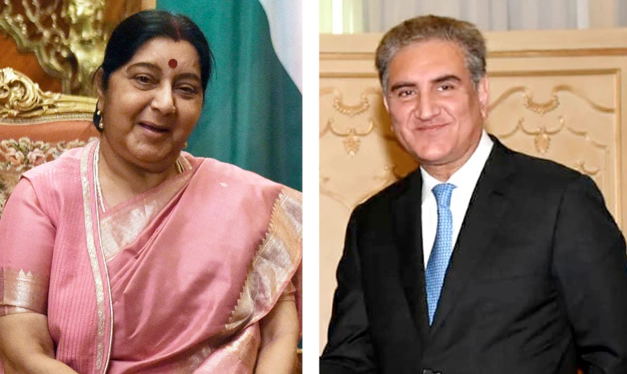 The combo shows Indian Foreign Minister Sushma Swaraj, left, and Pakistani Foreign Minister, Shah Mahmood Qureshi. (AFP)