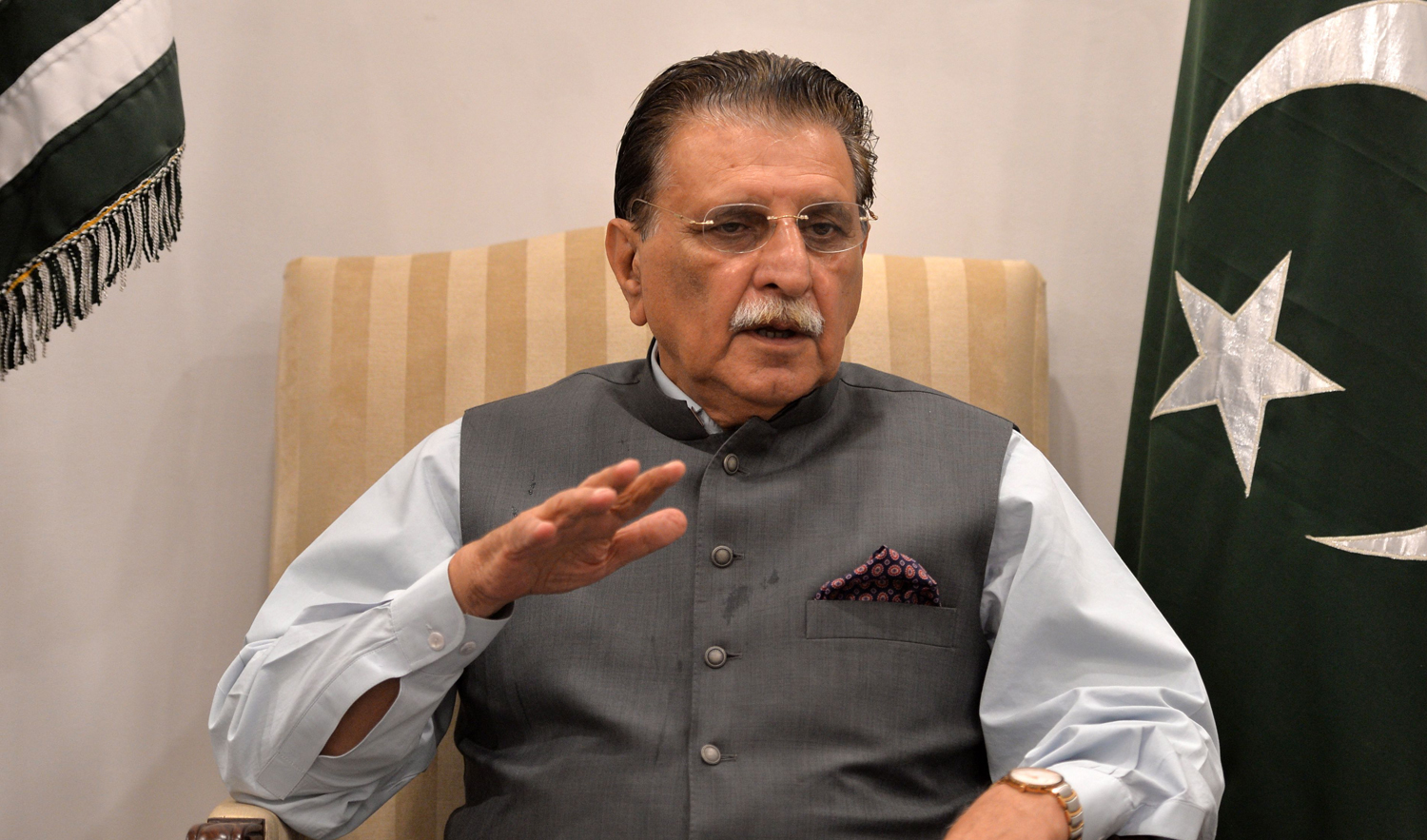 The Prime Minister of Azad Kashmir Raja Farooq Haider gestures as he speaks to media in Islamabad on Sept. 30, 2018. (AFP)