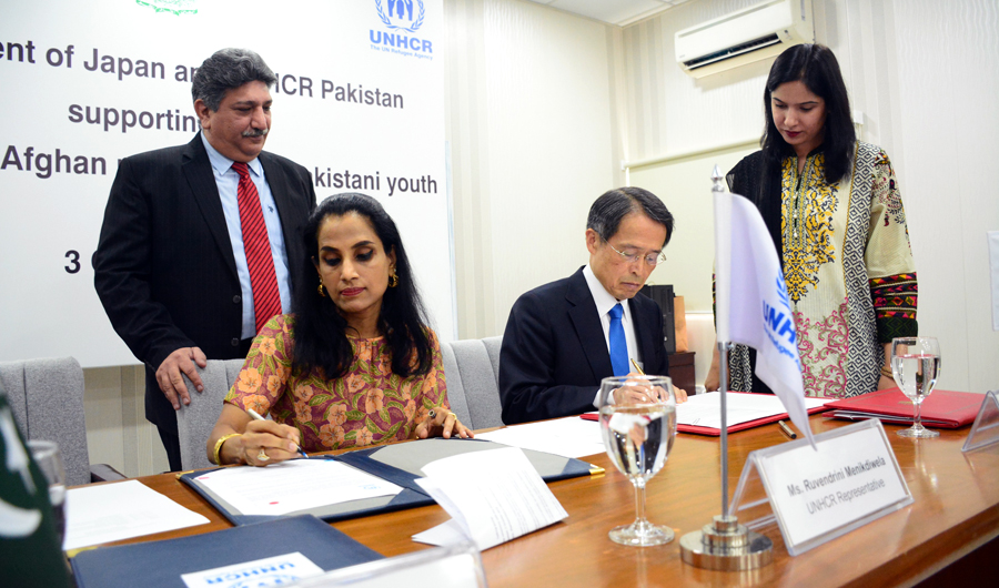 Japanese Ambassador to Pakistan, Takashi Kurai and UNHCR’s Country Representative in Pakistan, Ruvendrini Menikdiwela, signed an agreement in Islamabad on Wednesday to support Afghan refugees. (Photo courtesy: UNHCR)