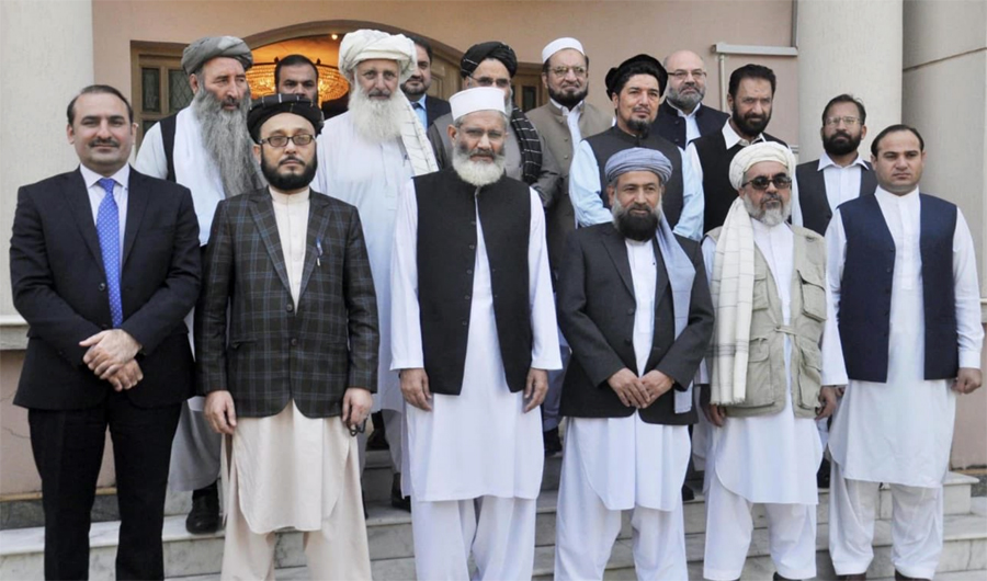 Jamaat-e-Islami (JI) chief Siraj ul Haq with the visiting Afghan scholars’ delegation in Islamabad. (JI photo)