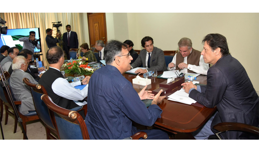 Prime Minister of Pakistan Imran Khan chaired on Monday a high level meeting at his office. Finance Minister Asad Umar ( left) said in a video statement after the meeting that Pakistan have no other option but to go to the IMF, to take a loan to support failing economy. (PID)