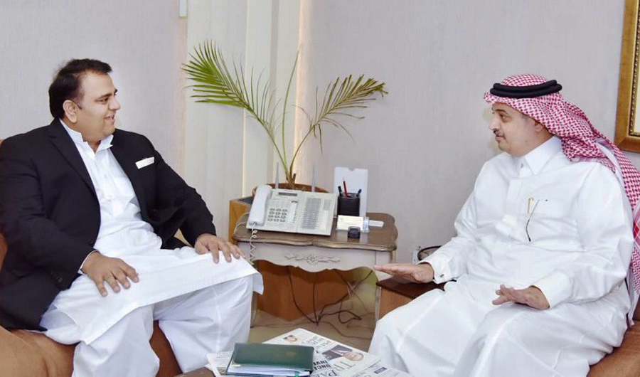 Fawad Chaudhry, federal minister for information and broadcasting in Pakistan, with ambassador Nawaf bin Said Al-Malki on Wednesday. (Photo by Saudi Embassy)