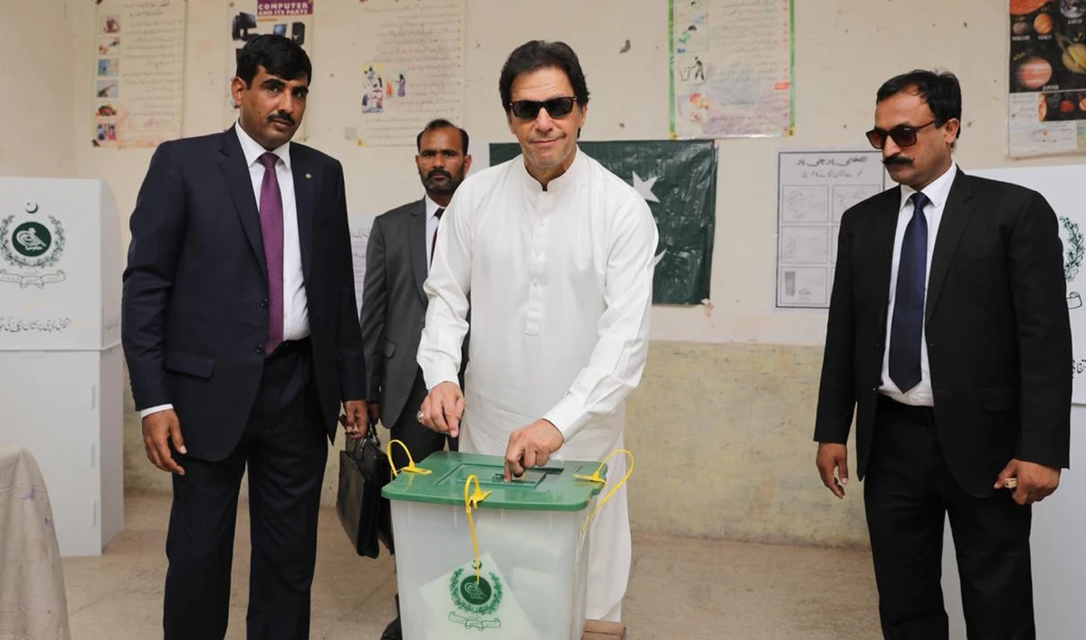 Pakistani prime minister Imran Khan casts his vote in NA-53 constituency during the ongoing by-elections, Sunday, Oct. 14, 2018. (Photo courtesy: @AzharLaghariPTI/Twitter)
