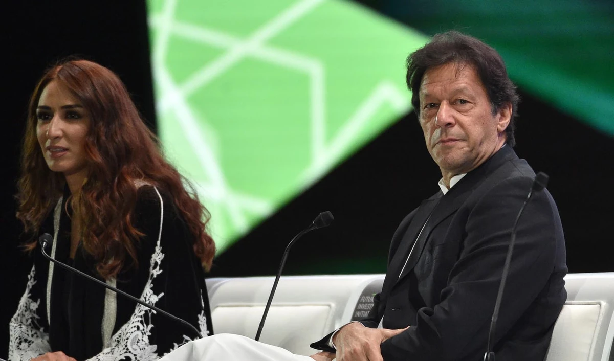 Pakistani Prime Minister Imran Khan, right, seen during the opening ceremony of the Future Investment Initiative (FII) conference in Riyadh on Oct. 23, 2018. (AFP)