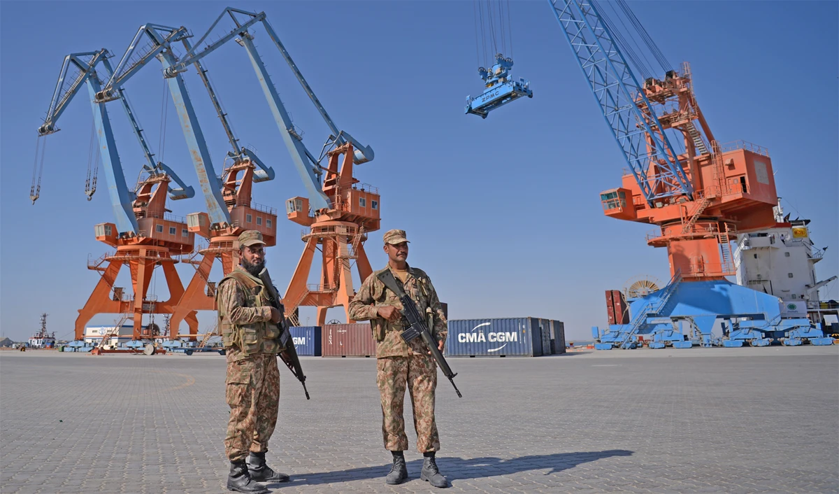 In this file photo, Pakistani Naval personnel stand guard near a ship carrying containers at the Gwadar port during the opening ceremony of a pilot trade program between Pakistan and China on Nov.13, 2016. (AFP)