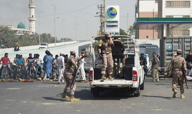 Pakistani rangers take position during the Tehreek-e-Labaik Pakistan (TLP), a hardline religious political party protest against the court decision to overturn the conviction of Christian woman Asia Bibi, in Karachi on October 31, 2018. (AFP)