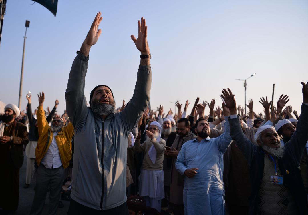 In this file photo, Pakistani protesters from the Tehreek-i-Labaik Yah Rasool Allah Pakistan (TLYRAP) religious group shout religious slogans during a protest in Islamabad on November 26, 2017. (AFP)