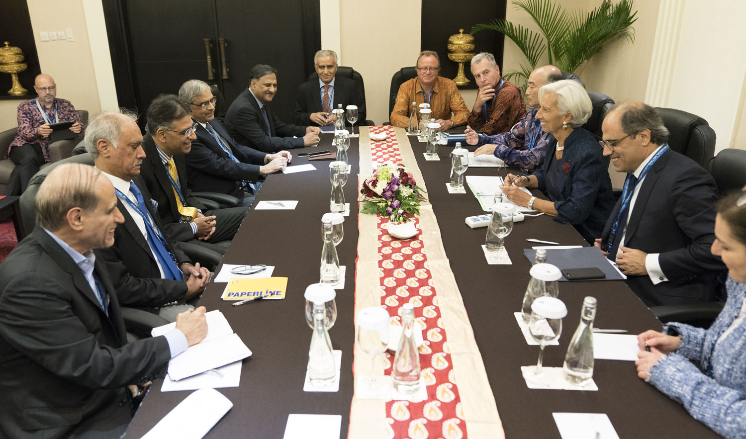 This handout file photo shows IMF Managing Director Christine Lagarde, third right, attending a meeting with Pakistan Finance Minister Asad Umar, third left, at the Bali Convention Center during the 2018 IMF/World Bank annual meetings in Nusa Dua on the Indonesian resort island of Bali on Oct. 11, 2018. (International Monetary Fund via AFP)