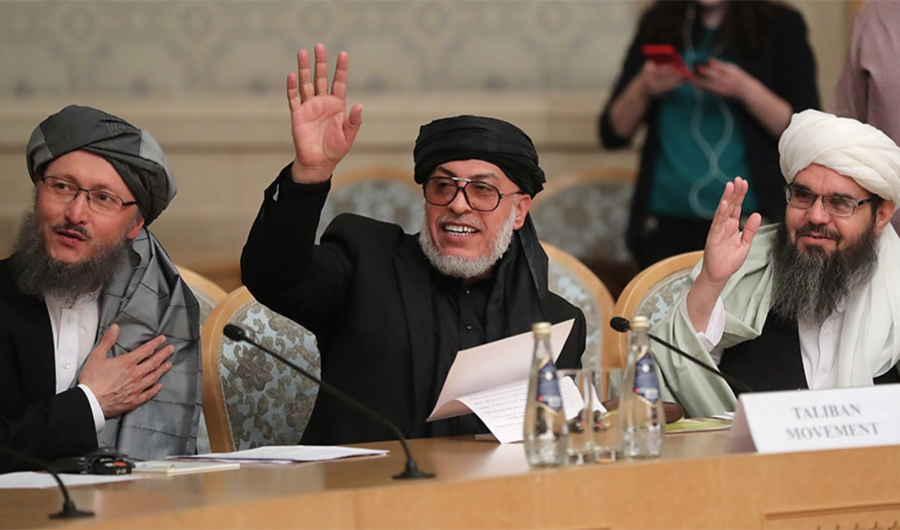 Head of the Taliban’s political office in Qatar Sher Mohammad Abbas Stanakzai,( middle), greeting other delegates during the multilateral peace talks on Afghanistan in Moscow, Russia, on Friday 09 November 2018. (Russian News agency, TASS)