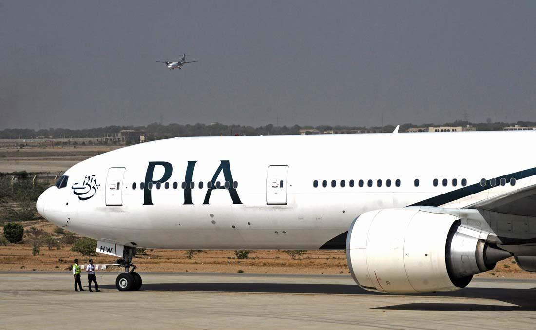 In this file photo, Pakistan International Airlines (PIA) plane taxies before take-off from Karachi International Airport in Karachi on April 21, 2010. (AFP)