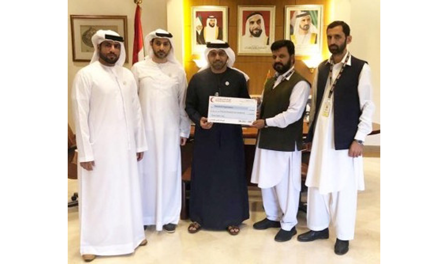 United Arab Emirates Ambassador to Pakistan, Hamad Obaid Ibrahim Salem Al Zaabi presents the Board of Directors of the Parwarish school and orphanage financial aid. Photo Courtesy: Emirates News Agency (WAM)
