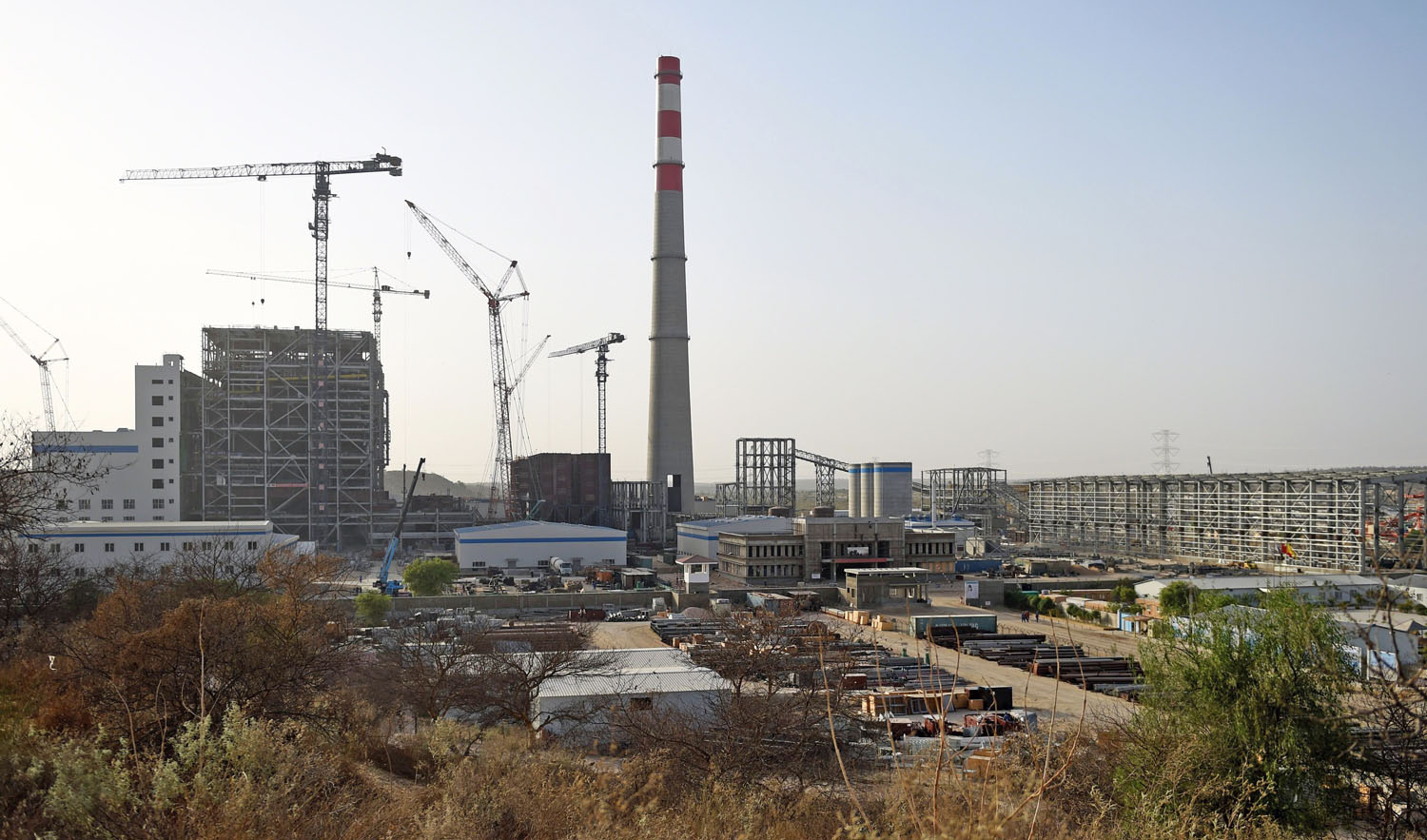 This file photo shows a general view of a Chinese-backed power plant under construction in Islamkot in the desert in the Tharparkar district of Pakistan’s southern Sindh province on May 23, 2018. (AFP)