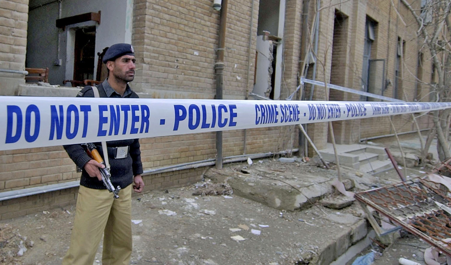 In this file photo, a Pakistani policeman stands guard at the site of a suicide bomb attack in Quetta, on Feb. 18, 2007. (AFP)