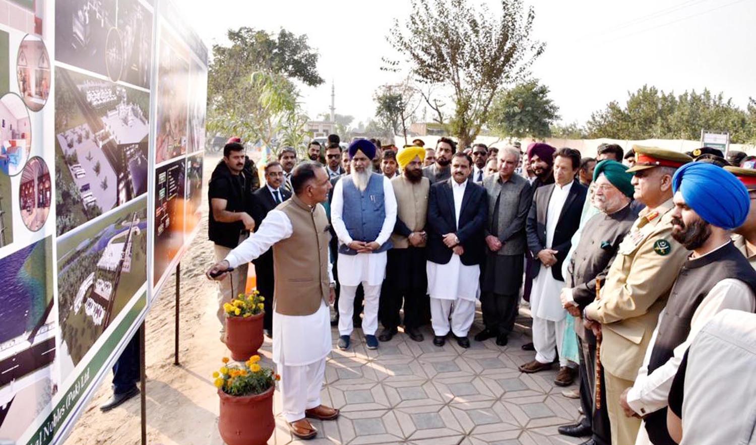 Prime Minister Imran Khan being briefed on the various phases in the construction of the Kartarpur corridor, in Kartarpur, on Wednesday. (Photo courtesy: Pakistan Press Information Department)