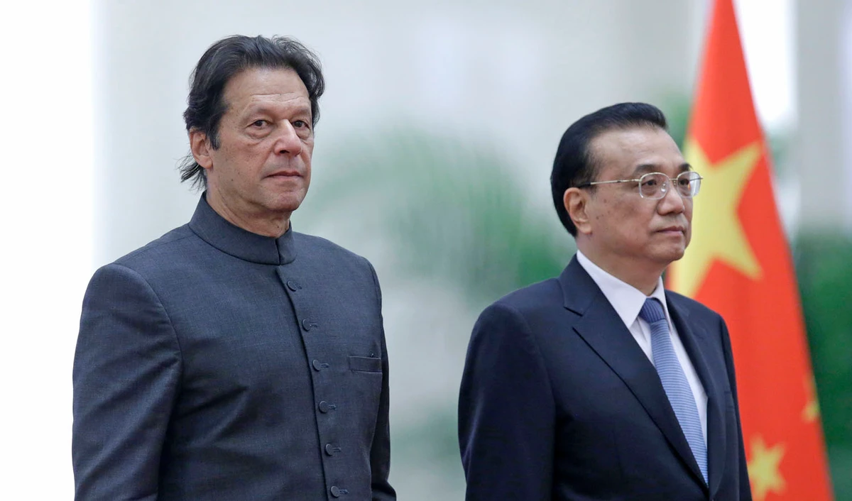 In this file photo, Pakistani Prime Minister Imran Khan, left, and China’s Premier Li Keqiang attend a welcome ceremony at the Great Hall of the People in Beijing on Nov. 3, 2018. (AFP)