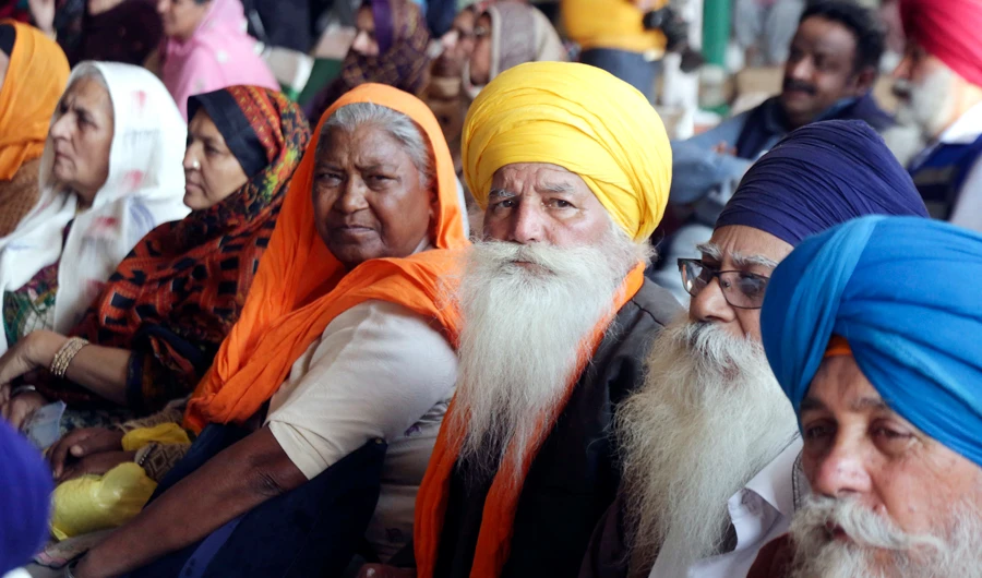 Visiting Indian Sikh pilgrims attend a ceremony in Kartarpur, Pakistan, on Wednesday, Nov. 28, 2018. (AP Photo/K.M. Chaudary)