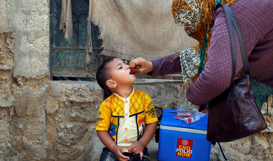 In this file photo, A boy receives polio vaccine drops, during an anti-polio campaign, in a low-income neighbourhood in Karachi, Pakistan on April 9, 2018. (REUTERS)